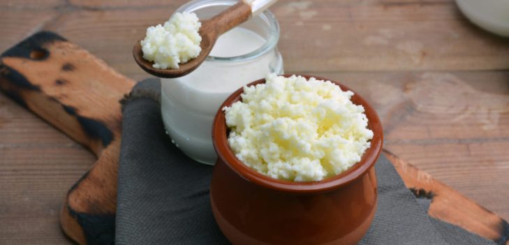 full of keffir, milk and yogurt cups liquid